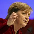 Merkel am Rednerpult, Foto: AP